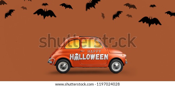 Halloween\
car delivering pumpkin against blue\
background