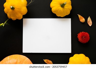 Halloween Card Mockup With Decorations, Pumpkins, Ghosts, Bats On Orange Background. Flat Lay, Top View