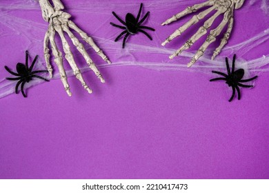 Halloween Card With Skeleton Hands And Spiders, Purple Background. Happy Halloween Banner Mockup