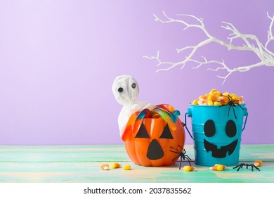 Halloween Celebration Concept With Candy Corn And Candy In Jack O Lantern Bucket For Trick And Treat