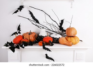 Halloween Composition On Fireplace In Room