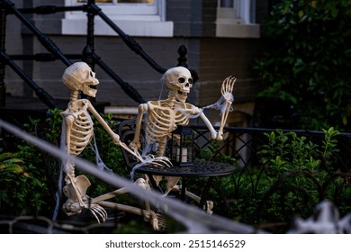 Halloween concept. Halloween pumpkin and skeleton for decorated house. Scary Decorated at front yard of a American home. Trick or treat. Halloween background. Autumn holiday of Halloween.