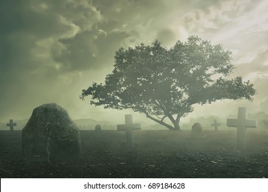 Halloween Concept, Spooky Graveyard Scene Complete With Scary Trees, Deep Fog And Creepy Clouds.