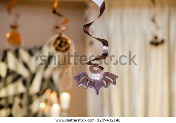 Halloween Decoration Silver Paper Bat Hanging Stock Photo