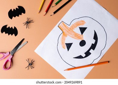 Halloween decoration and stationery orange color background  Childrens craft for Halloween  DIY creative idea 