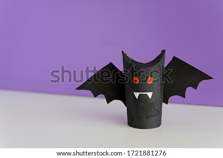 Halloween decoration, vampire bat made from toilet paper roll, easy crafts for kids.           