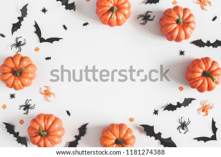 Halloween decorations on pastel gray background. Halloween concept. Flat lay, top view, copy space