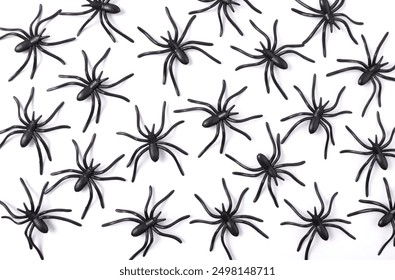 Halloween decorations. Spider background on a white background. Plastic spiders. Flat lay, top view. - Powered by Shutterstock