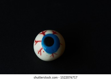 A Halloween Eyeball On Black Background