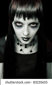 Halloween. Fashion portrait of night vampire gothic style woman. Zombie or witch