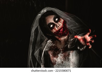 Halloween Festival Concept,Asian Woman Makeup Ghost Face,Bride Zombie Charactor,Horror Movie Wallpaper Or Poster