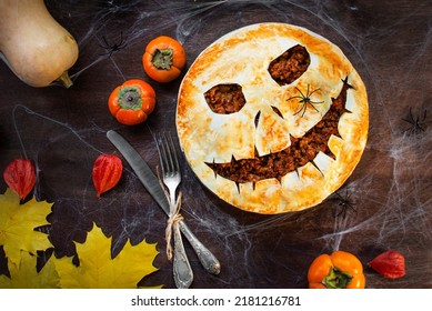 Halloween Food. Halloween Cake. Halloween Homemade Cakes. Autumn Theme. Homemade Dessert Idea.Halloween Hot Dog.Dark Wooden Background.