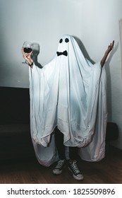 Halloween Ghost Cheering With Wine Wearing Black Bow