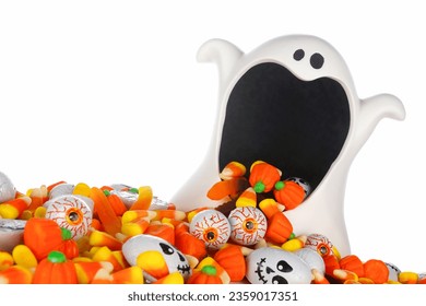 Halloween ghost wide mouth bowl with spilling candy. Close up behind a pile of treats isolated on a white background. - Powered by Shutterstock