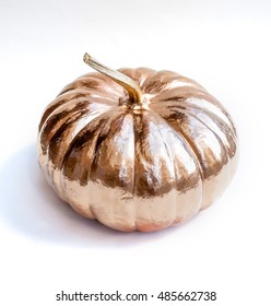 Halloween Gold Pumpkin Painted. Holiday Decoration. White Background