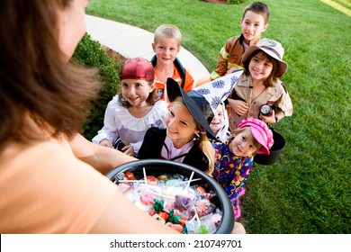 Halloween: Group Of Kids Want Halloween Candy