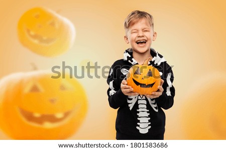 Similar – Foto Bild Fröhliches Halloween. Lustiges Kind in einem Skelettkostüm von Halloween.