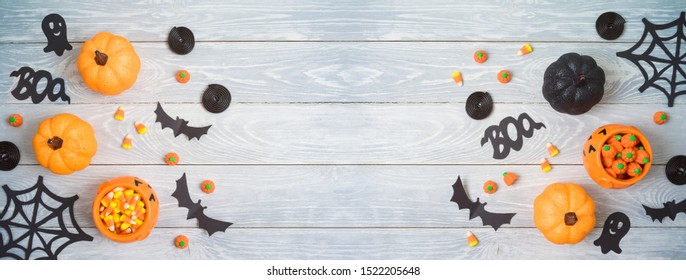 Halloween Holiday Party Background With Glitter Pumpkin Decor And Candy .Top View From Above. Flat Lay
