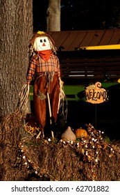 A Halloween Holiday Scarecrow Welcoming Trick Or Treaters