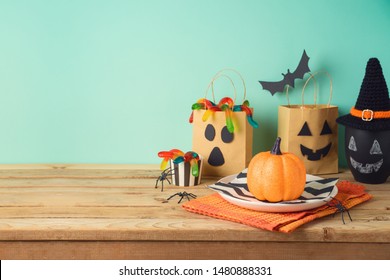Halloween Holiday Table Setting With Glitter Pumpkin, Party Gift Paper Bag Decor And Candy