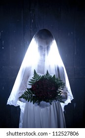 Halloween: Horror scene of a corpse bride standing