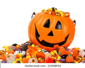 Halloween Jack o Lantern pail overflowing with candy - Powered by Shutterstock