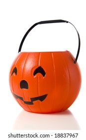 A Halloween Jack-o-lantern Candy Bucket On A White Background