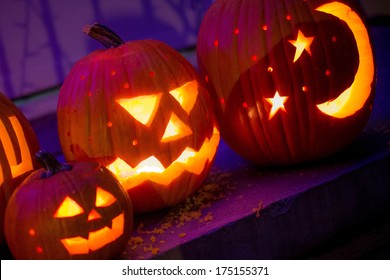 Halloween Jack-o-lanterns Sit On The Porch Of An Omaha Nebraska Home.