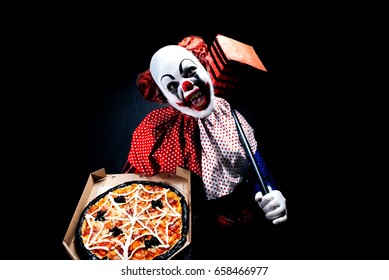 Halloween Night Party With Scary Evil Clown And Pizza With Spiders