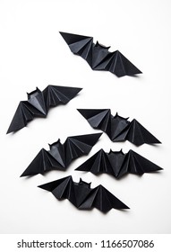 Halloween Origami Paper Dracula Bats On A White Background