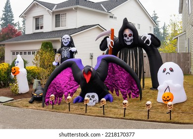 Halloween outdoor decorations with inflatable ghosts, crow, skeleton, death, sculls