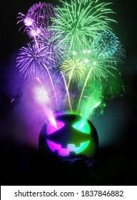 Halloween Party Background. A Jack O Lantern Carved Pumpkin Glowing Purple And Green With Fireworks Being Released Into The Night Sky. Photo Composite.