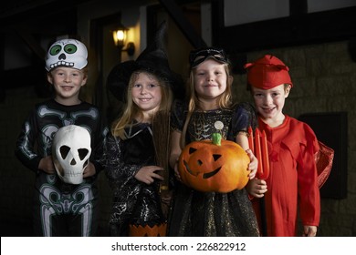 Halloween Party With Children Trick Or Treating In Costume  - Shutterstock ID 226822912