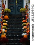 Halloween pumpkin decorations. Pumpkin for decorated house. Halloween Decorated at front yard of a American home. Halloween decorated front door with pumpkins. Autumn holiday of Halloween.