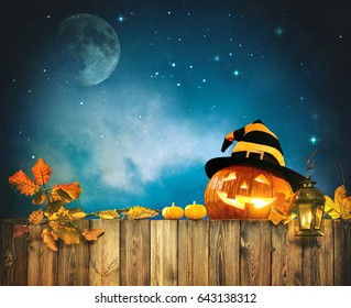 Halloween Pumpkin Head Jack Lantern On Wooden Fence