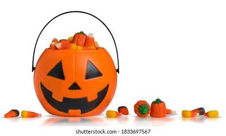 Halloween Pumpkin Jack-o-lantern Bucket With Candy Corn For Celebration Halloween. Orange Pumpkin With Scary Smile Face Jack-o-lantern. Bucket For Candy. Trick Or Treat And Happy Halloween