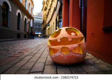 Halloween Pumpkin on old town street in Riga.