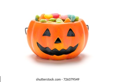 Halloween Pumpkin With A Pile Of Colorful Candy