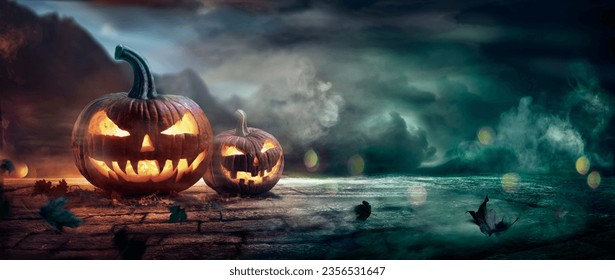 Halloween Pumpkins In A Spooky Night With Abstract Defocused Light And Smoke Effects - Powered by Shutterstock