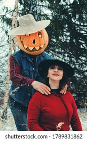 Halloween Scarecrow Takes Care Of The Witch Kneading Her Shoulders With A Massage, The Witch Is Very Happy Smiles Touched By Such Unexpected Care