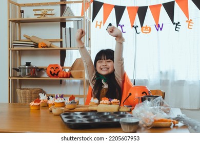 Halloween Sweets, Happy Family And Child Happy Girl, The Holiday Halloween, Happy Halloween And Baking Cookies. 