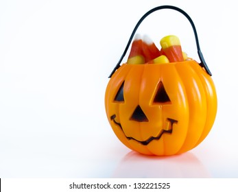Halloween Treat Bag Filled With Candy Corn Candies On White Background.