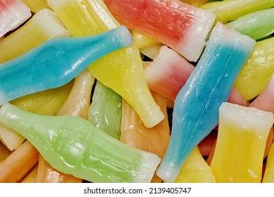 Halloween wax candy bottles scattered sweets colorful background lollies. - Powered by Shutterstock