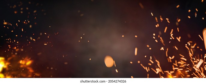 Halloween Witch .  Fire embers particles over black background. Fire sparks background. Abstract dark glitter fire particles lights. 