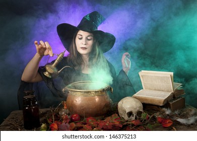 halloween witch making a potion