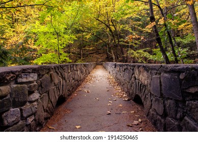 Hallowell, Maine, USA.  09-29-2020:  A view across the lower bridge at Vaughan Woods.