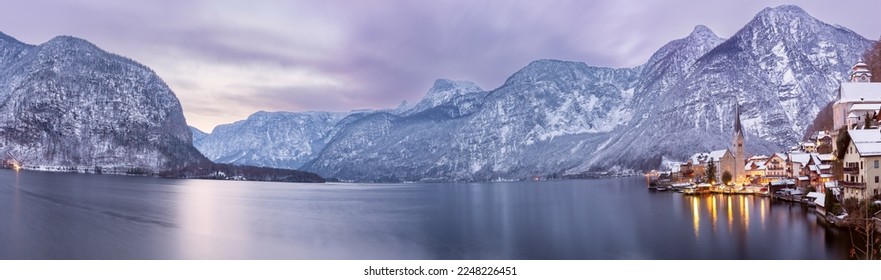 Hallstatt. Panoramic view of the mountains and Hallstattersee lake in the early morning. - Shutterstock ID 2248226451
