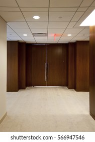 Hallway In Corporate Headquarters Leading To Doors To A Conference Room