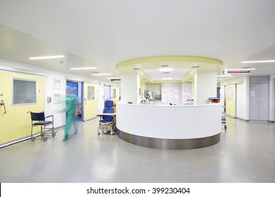 Hallway The Emergency Room And Outpatient Clinic At The Hospital With Doctor In Movement