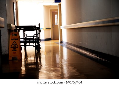 hallway in hospital with bed.